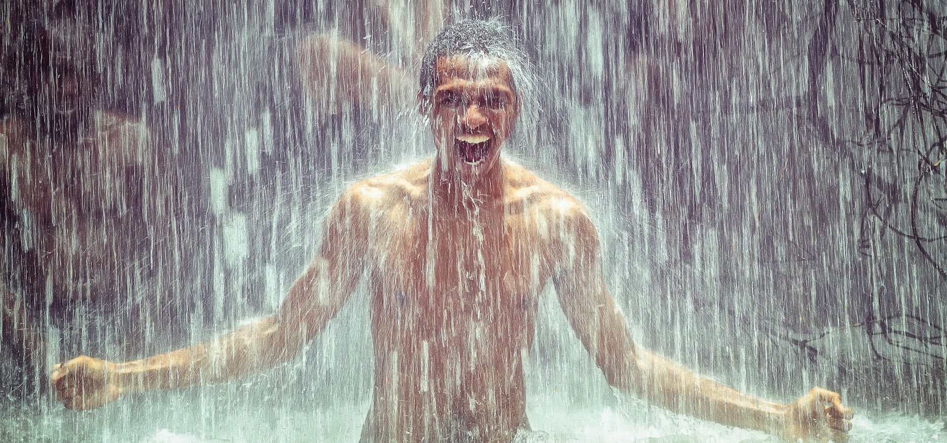1920×900 man-under-waterfall 1920x900 man-under-waterfall